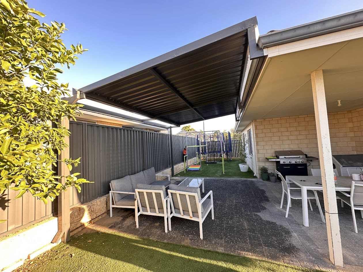 Flat roof patio over a furnished alfresco with outdoor lounge and BBQ in Perth, WA