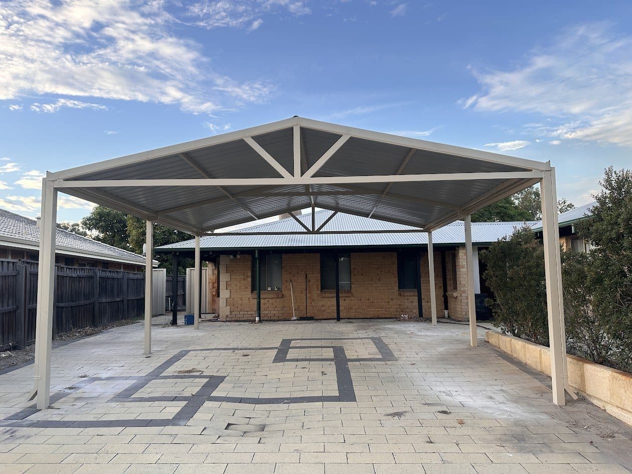 Freestanding gable patio with exposed steel king-post truss over a paved courtyard in Perth, WA