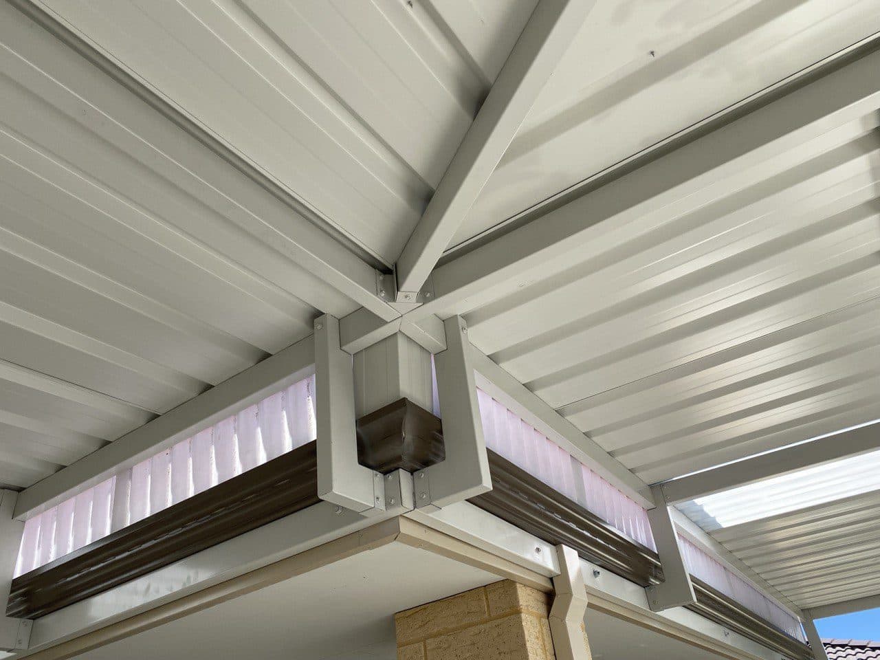 Close-up of a gable patio's exposed steel king-post truss and Colorbond roofing in Perth, WA