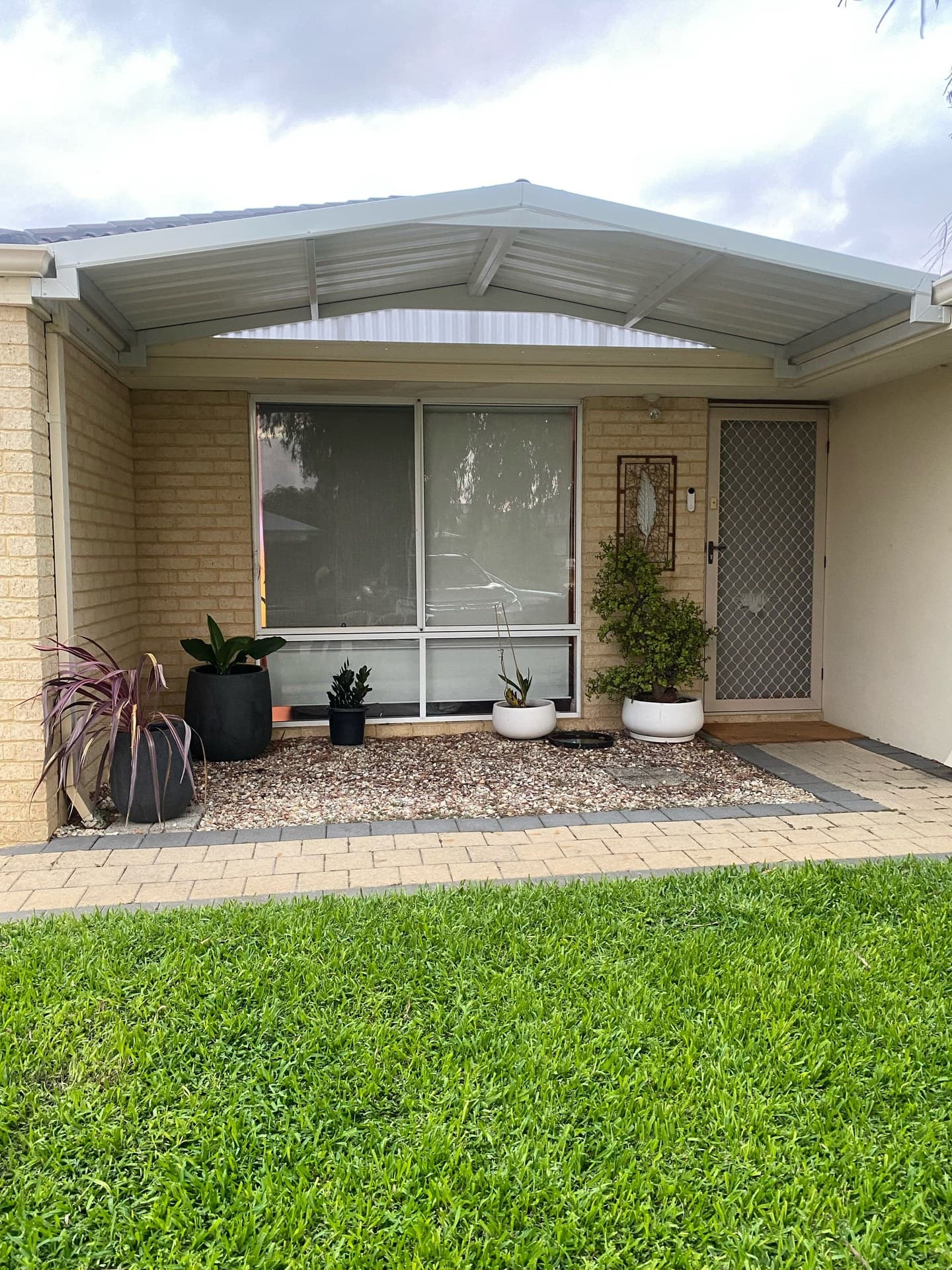 Gable verandah with garden landscaping at front entry of a Perth property