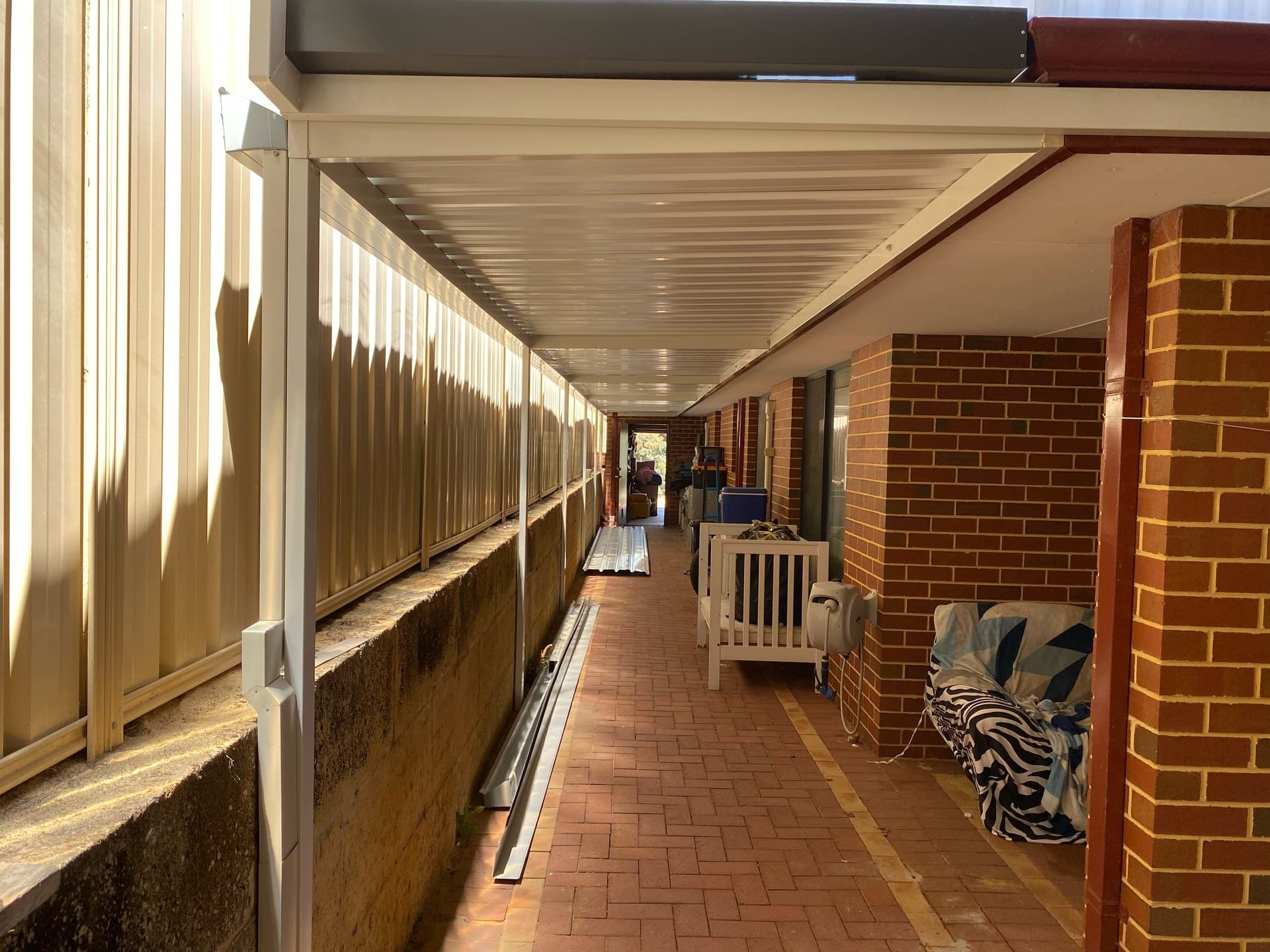 Modern flat roof patio extension over outdoor living space in Perth, WA